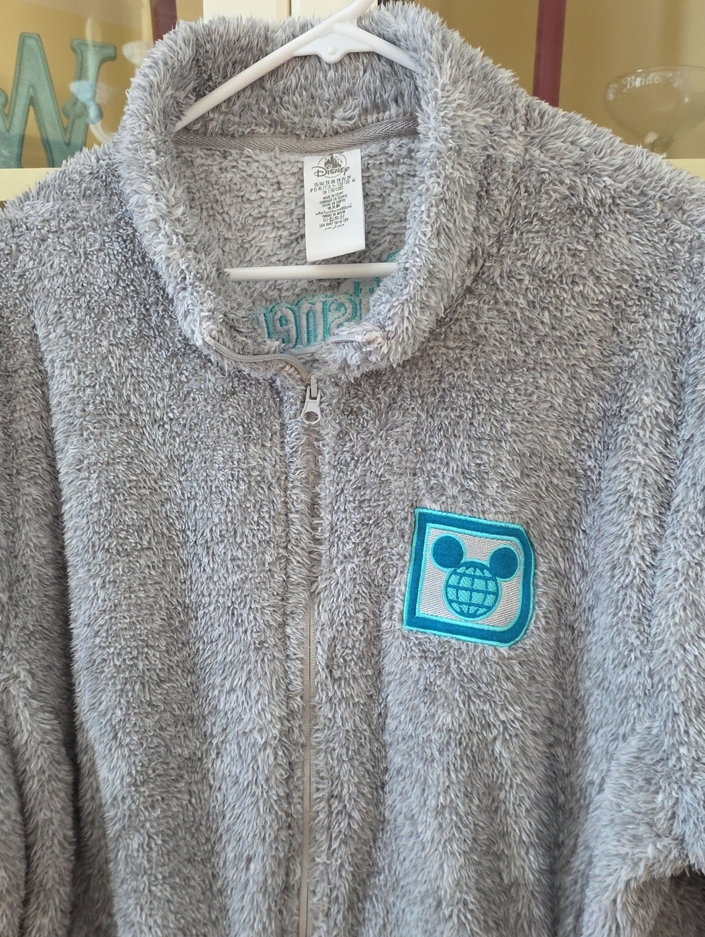 Disney Plush Zip Jacket in Light Gray with Teal Patch